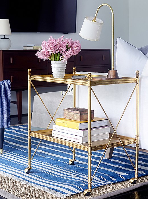 With its open shelving, a tea trolley takes up less visual space than many occasional tables, making them great for smaller rooms. Photo by Manuel Rodriguez.
